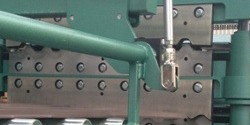 Hayes end tamping system